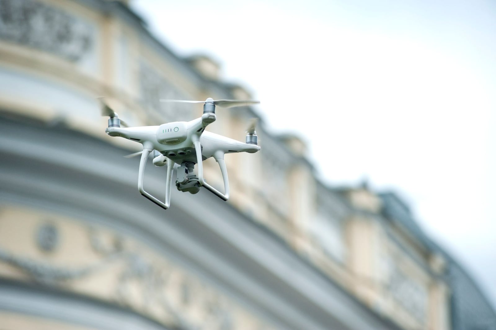 Drone in flight for a roof inspection