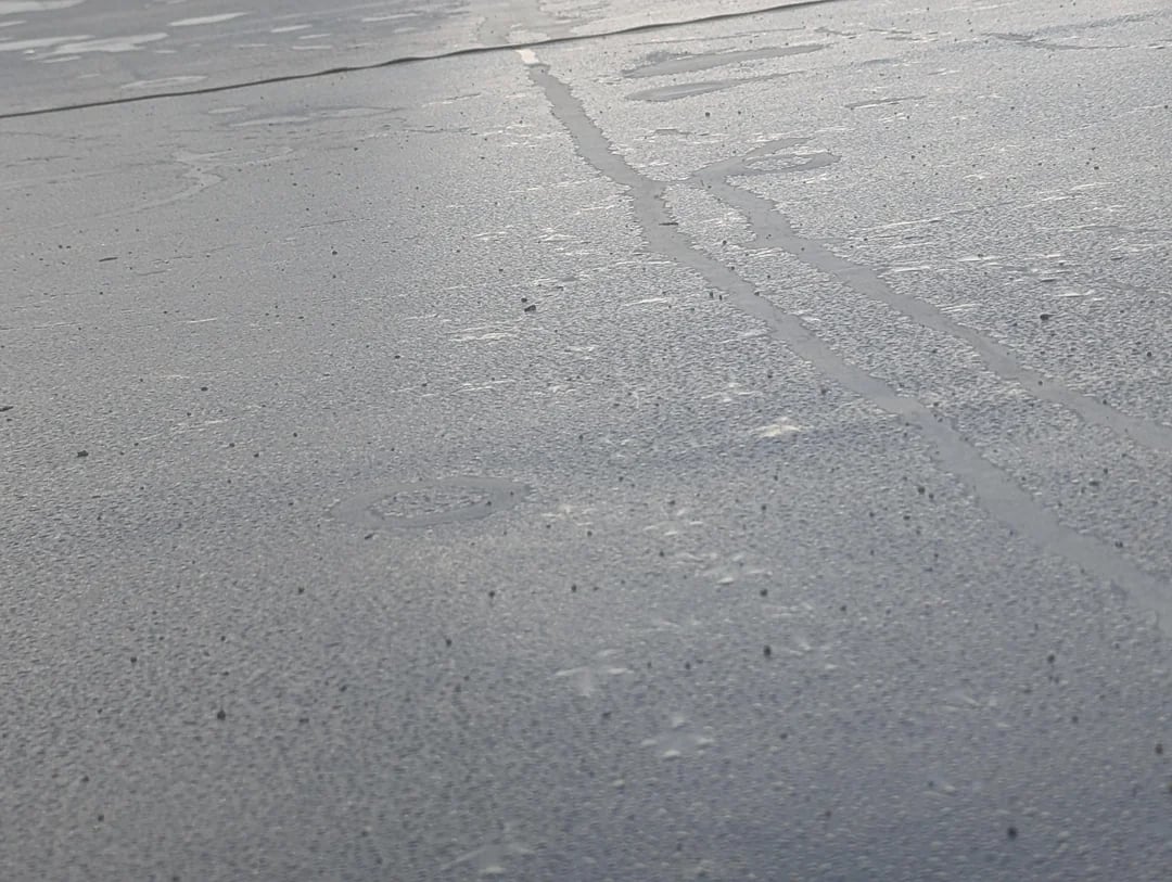 Flat roof membrane close up on a Huntington Beach home