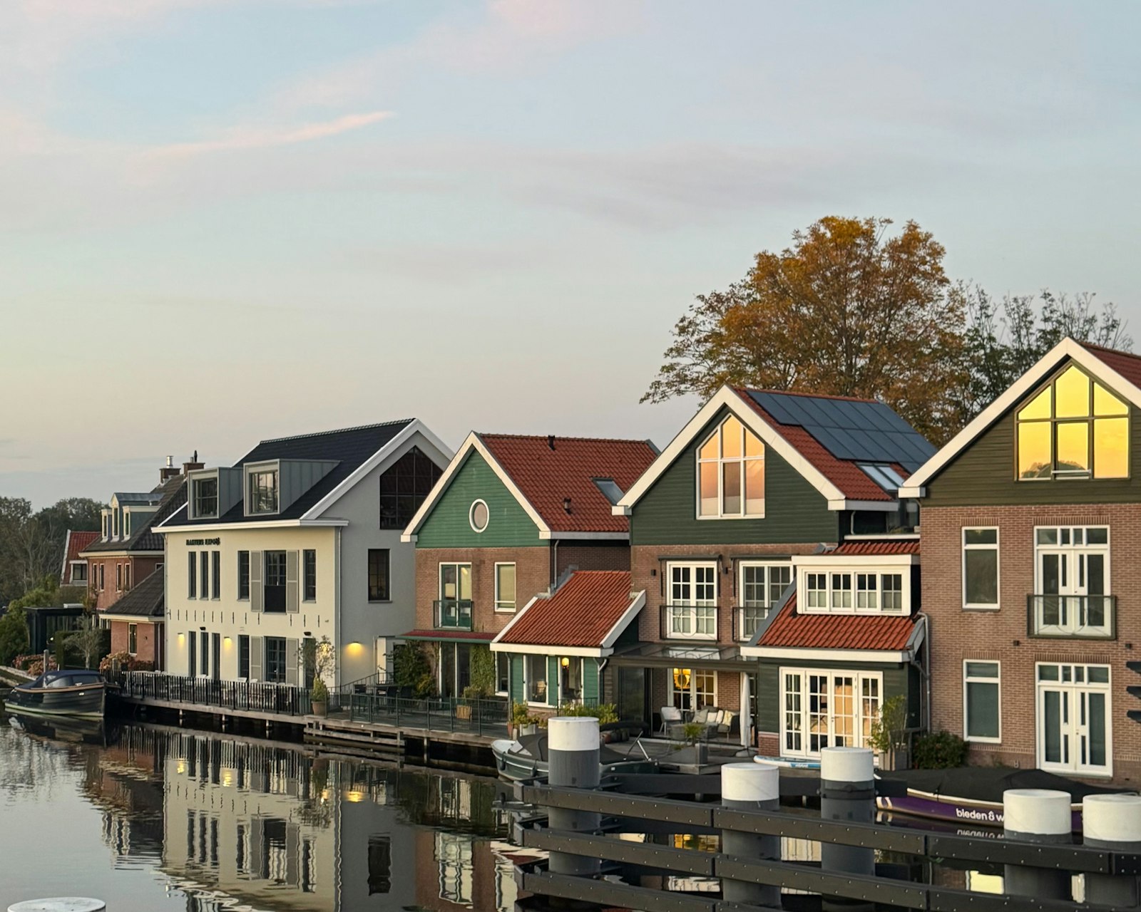 Roof repair Huntington Harbour — canal-front homes at dusk