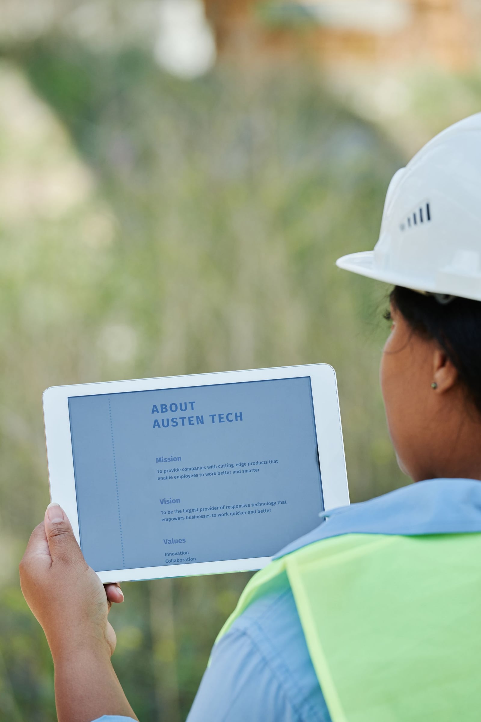 Reviewing drone roof inspection results on a tablet