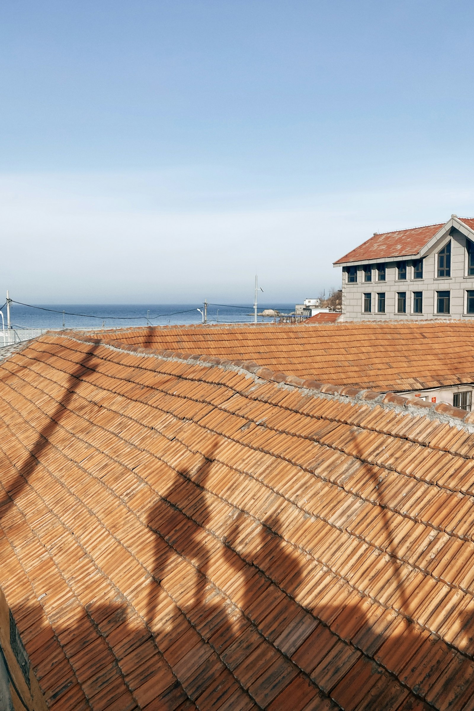 After: storm damage roof repair Huntington Beach completed
