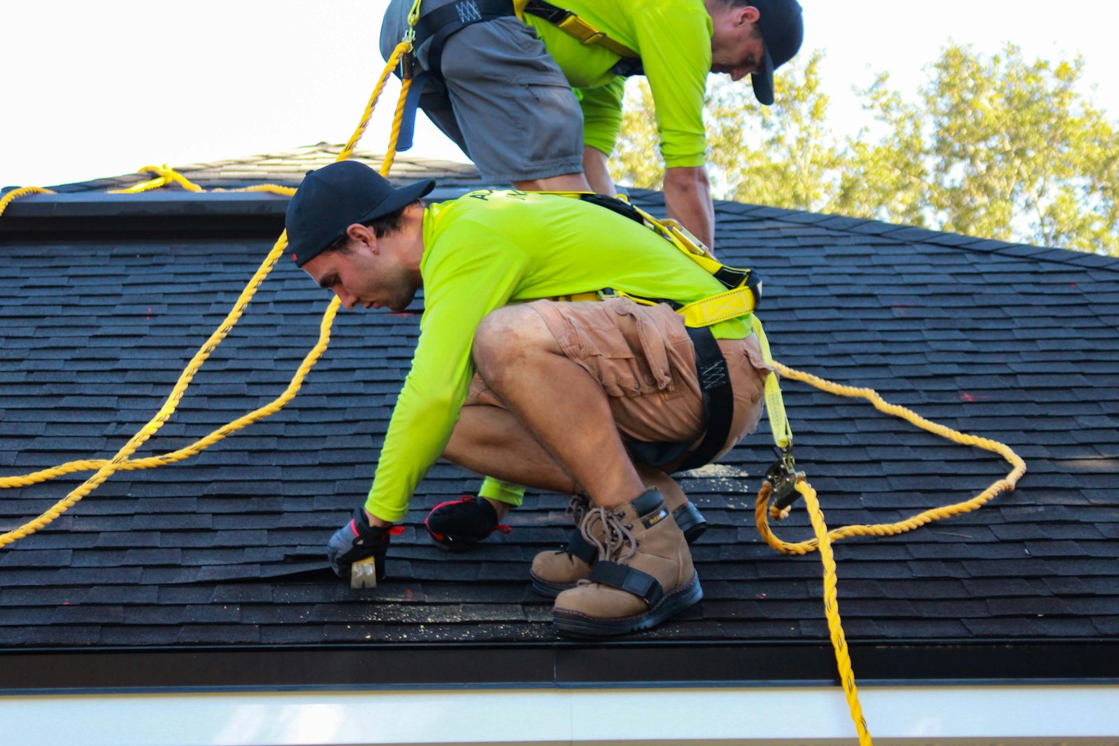 Roof repair Huntington Beach — roofing contractor installing a shingle roof
